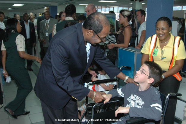 Minister of Tourism, Hon. Edmund Bartlett - Director of Tourism, Basil Smith, and Mayor of Montego Bay, Councilor Charles Sinclair Launch of Winter Tourism Season at Sangster International Airport, Saturday, December 15, 2007 - Sangster International Airport - MBJ Airports Limited, Montego Bay, Jamaica W.I. - Photographs by Net2Market.com - Barry J. Hough Sr, Photographer - Negril Travel Guide, Negril Jamaica WI - http://www.negriltravelguide.com - info@negriltravelguide.com...!