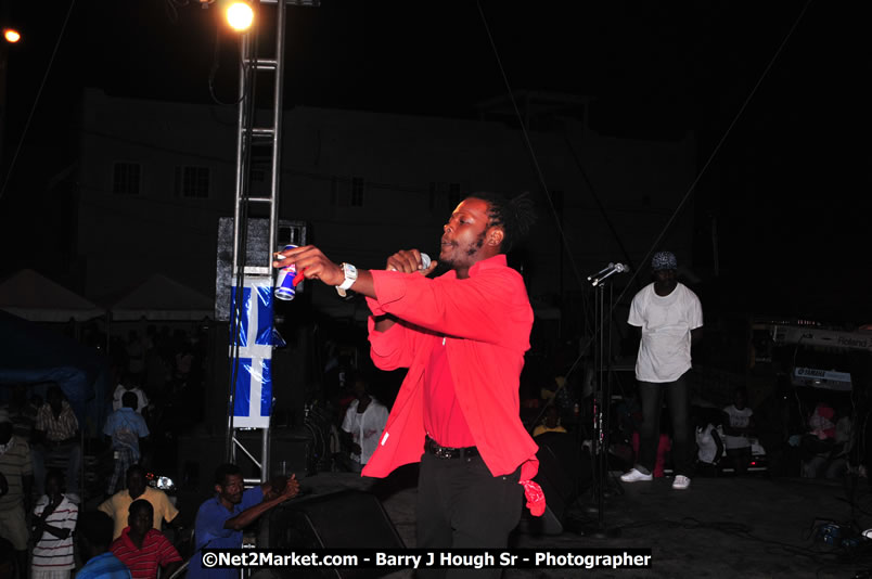 Lucea Cross the Harbour @ Lucea Car Park - All Day Event - Cross the Harbour Swim, Boat Rides, and Entertainment for the Family - Concert Featuring: Bushman, George Nooksl, Little Hero, Bushi One String, Dog Rice and many local Artists - Friday, August 1, 2008 - Lucea, Hanover Jamaica - Photographs by Net2Market.com - Barry J. Hough Sr. Photojournalist/Photograper - Photographs taken with a Nikon D300 - Negril Travel Guide, Negril Jamaica WI - http://www.negriltravelguide.com - info@negriltravelguide.com...!