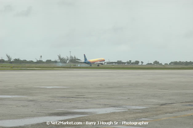 Air Jamaica Airline - Landing & Take Off - MBJ Airports Limited - Sangster International Airport - Domestic Terminal - Montego Bay, St James, Jamaica W.I. - MBJ Limited - Transforming Sangster International Airport into a world class facility - Photographs by Net2Market.com - Negril Travel Guide, Negril Jamaica WI - http://www.negriltravelguide.com - info@negriltravelguide.com...!