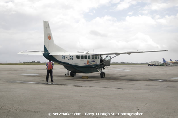 Intl. Airl Link - The Ultimate Connection - MBJ Airports Limited - Sangster International Airport - Domestic Terminal - Montego Bay, St James, Jamaica W.I. - MBJ Limited - Transforming Sangster International Airport into a world class facility - Photographs by Net2Market.com - Negril Travel Guide, Negril Jamaica WI - http://www.negriltravelguide.com - info@negriltravelguide.com...!