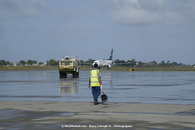 MBJ Airports Limited Welcomes WestJet Airlines - Inaugural Scheduled Service From Toronto Pearsons International Airport - Monday, December 10, 2007 - Sangster International Airport - MBJ Airports Limited, Montego Bay, Jamaica W.I. - Photographs by Net2Market.com - Barry J. Hough Sr, Photographer - Negril Travel Guide, Negril Jamaica WI - http://www.negriltravelguide.com - info@negriltravelguide.com...!