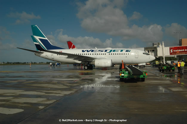 MBJ Airports Limited Welcomes WestJet Airlines - Inaugural Scheduled Service From Toronto Pearsons International Airport - Monday, December 10, 2007 - Sangster International Airport - MBJ Airports Limited, Montego Bay, Jamaica W.I. - Photographs by Net2Market.com - Barry J. Hough Sr, Photographer - Negril Travel Guide, Negril Jamaica WI - http://www.negriltravelguide.com - info@negriltravelguide.com...!