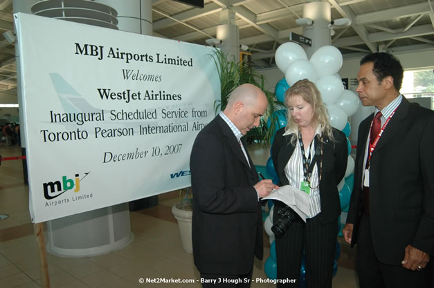 MBJ Airports Limited Welcomes WestJet Airlines - Inaugural Scheduled Service From Toronto Pearsons International Airport - Monday, December 10, 2007 - Sangster International Airport - MBJ Airports Limited, Montego Bay, Jamaica W.I. - Photographs by Net2Market.com - Barry J. Hough Sr, Photographer - Negril Travel Guide, Negril Jamaica WI - http://www.negriltravelguide.com - info@negriltravelguide.com...!