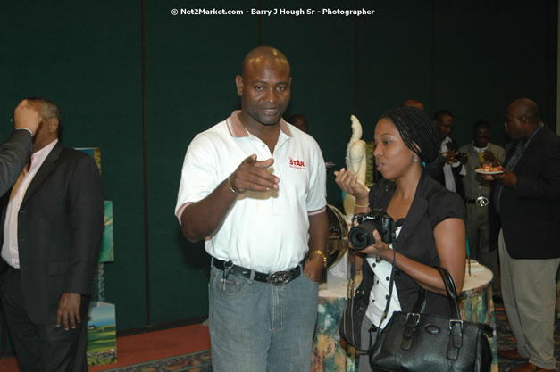Red Cap Porters Awards - Minister of Tourism, Hon. Edmund Bartlett - Director of Tourism, Basil Smith - Friday, December 14, 2007 - Holiday Inn Sunspree, Montego Bay, Jamaica W.I. - Photographs by Net2Market.com - Barry J. Hough Sr, Photographer - Negril Travel Guide, Negril Jamaica WI - http://www.negriltravelguide.com - info@negriltravelguide.com...!