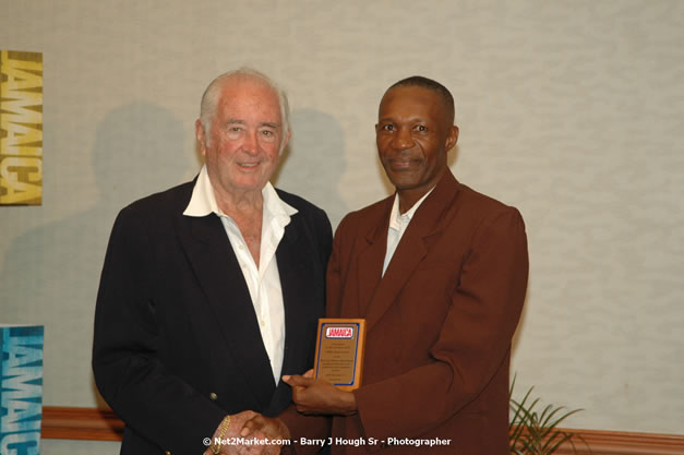 Red Cap Porters Awards - Minister of Tourism, Hon. Edmund Bartlett - Director of Tourism, Basil Smith - Friday, December 14, 2007 - Holiday Inn Sunspree, Montego Bay, Jamaica W.I. - Photographs by Net2Market.com - Barry J. Hough Sr, Photographer - Negril Travel Guide, Negril Jamaica WI - http://www.negriltravelguide.com - info@negriltravelguide.com...!