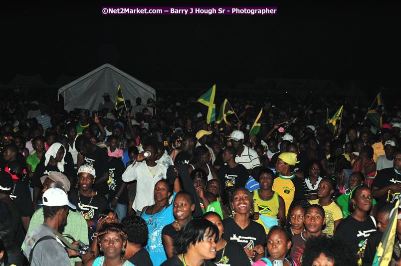 Usain Bolt of Jamaica - The Fastest Man In The World  - Usain Bolt Homecoming Celebrations Concert at the William Knibb High School Play Field, Trelawny - Ice, Ding Dong, Ravers Clavers, D'Angel, Voicemail, RDX and Dancers, Wayne Marshall, Tammi Chynn, Bugle, Nero, Tanya Stephens, Richie Spice, Kip Rich,and Shaggy - Photographs by Net2Market.com - Barry J. Hough Sr. Photojournalist/Photograper - Photographs taken with a Nikon D300 - Negril Travel Guide, Negril Jamaica WI - http://www.negriltravelguide.com - info@negriltravelguide.com...!