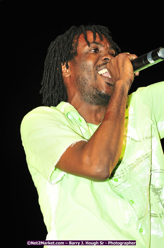 Usain Bolt of Jamaica - The Fastest Man In The World  - Usain Bolt Homecoming Celebrations Concert at the William Knibb High School Play Field, Trelawny - Ice, Ding Dong, Ravers Clavers, D'Angel, Voicemail, RDX and Dancers, Wayne Marshall, Tammi Chynn, Bugle, Nero, Tanya Stephens, Richie Spice, Kip Rich,and Shaggy - Photographs by Net2Market.com - Barry J. Hough Sr. Photojournalist/Photograper - Photographs taken with a Nikon D300 - Negril Travel Guide, Negril Jamaica WI - http://www.negriltravelguide.com - info@negriltravelguide.com...!