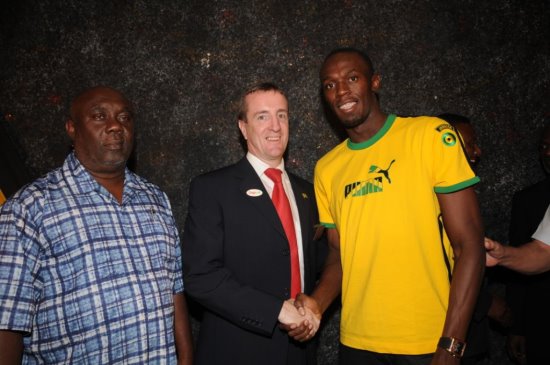 Digicel Jamaica CEO, Mark Linehan, chats with Usain Bolt and his Manager, Glen Mills -  Negril Travel Guide - Negril, Jamaica WI - NegrilTravelGuide.com - http://www.negriltravelguide.com - info@negriltravelguide.com