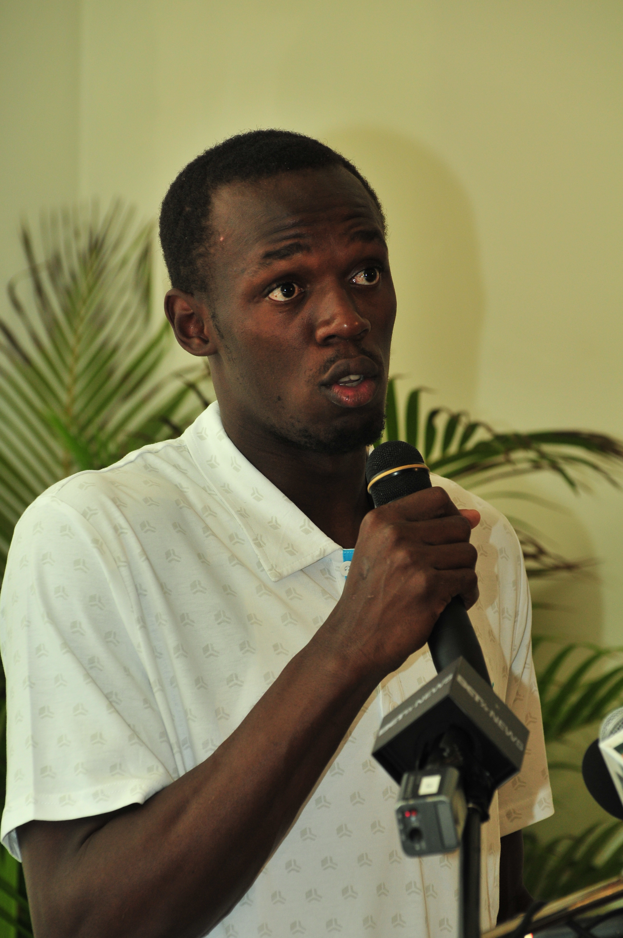 Press Photos - Usain Bolt Homecoming - Press Conference, Waldensai Primary School, and Conert - Photographs by Net2Market.com - Barry J. Hough Sr. Photojournalist/Photograper - Photographs taken with a Nikon D300 - Negril Travel Guide, Negril Jamaica WI - http://www.negriltravelguide.com - info@negriltravelguide.com...!