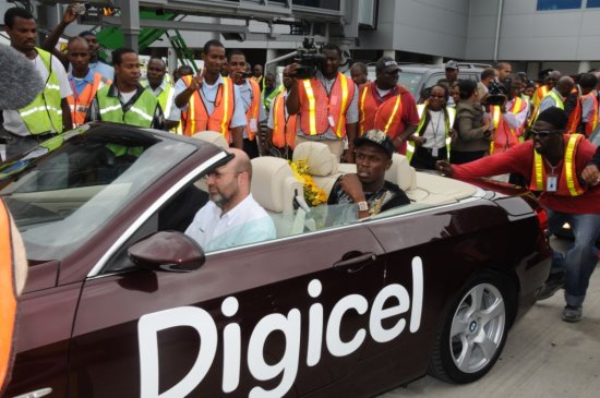 Triple Olympic gold medalist and Digicel-sponsored Usain Bolt, departs Norman Manley International Airport - Negril Travel Guide - Negril, Jamaica WI - NegrilTravelGuide.com - http://www.negriltravelguide.com - info@negriltravelguide.com